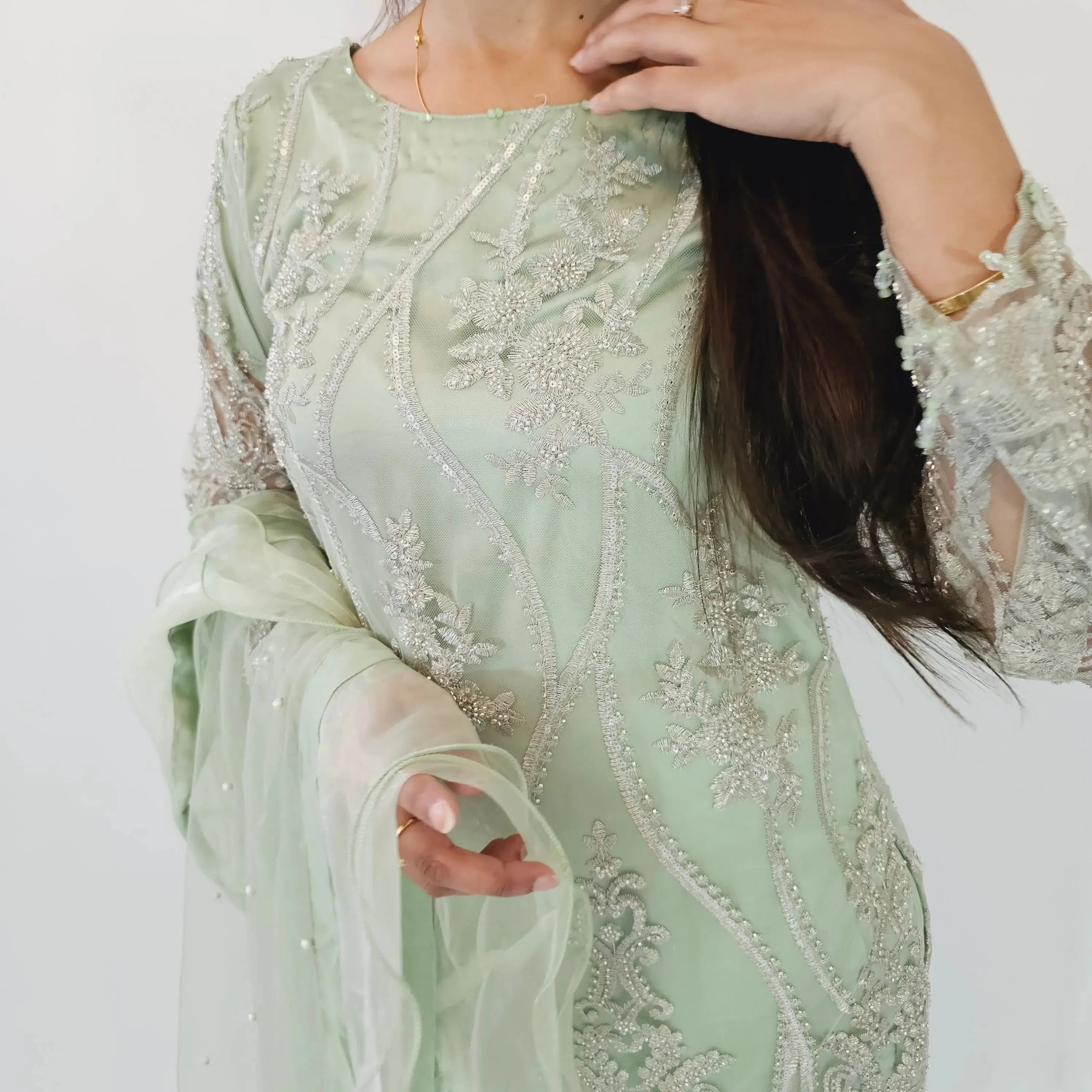 green embroidered kurti with net dupatta